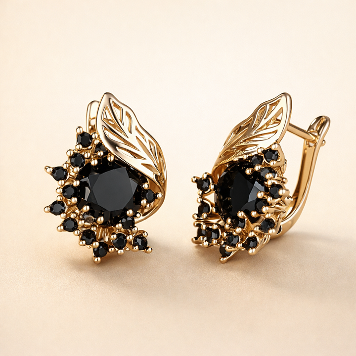 Elegant gold earrings with black cubic zirconia