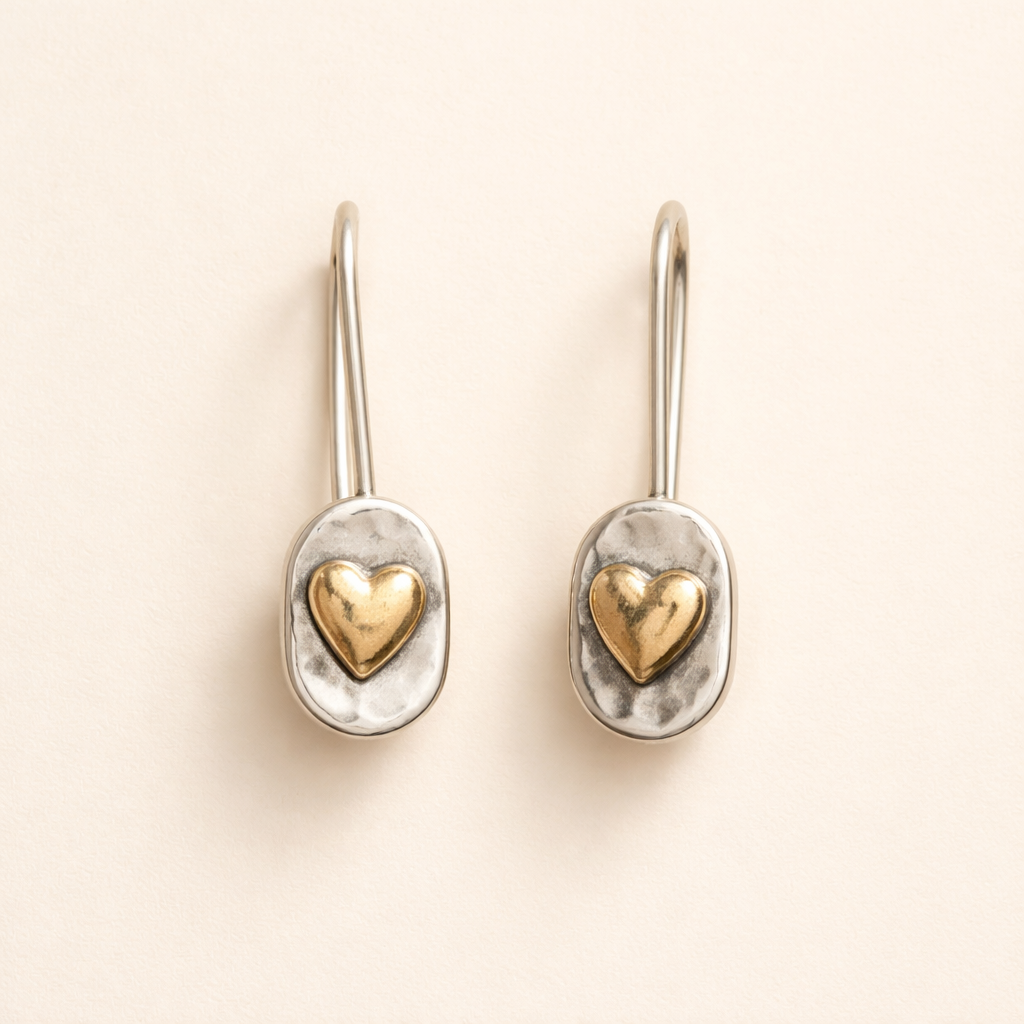 Elegant gold earrings with little heart