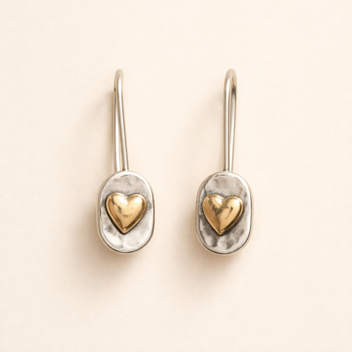 Elegant gold earrings with little heart