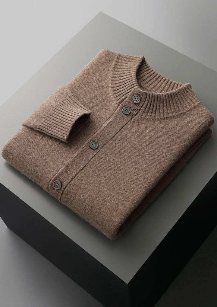 100% CASHMERE BUTTON CARDIGAN.