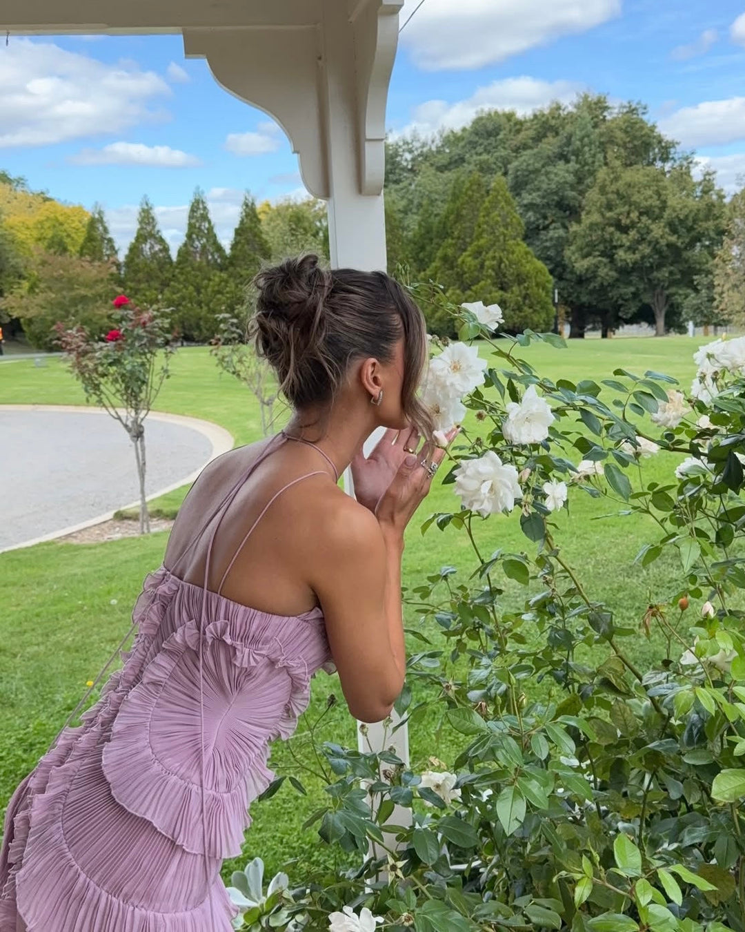 Women's Summer Dress with Open Back, Bow at Waist, and Ruffled Hem