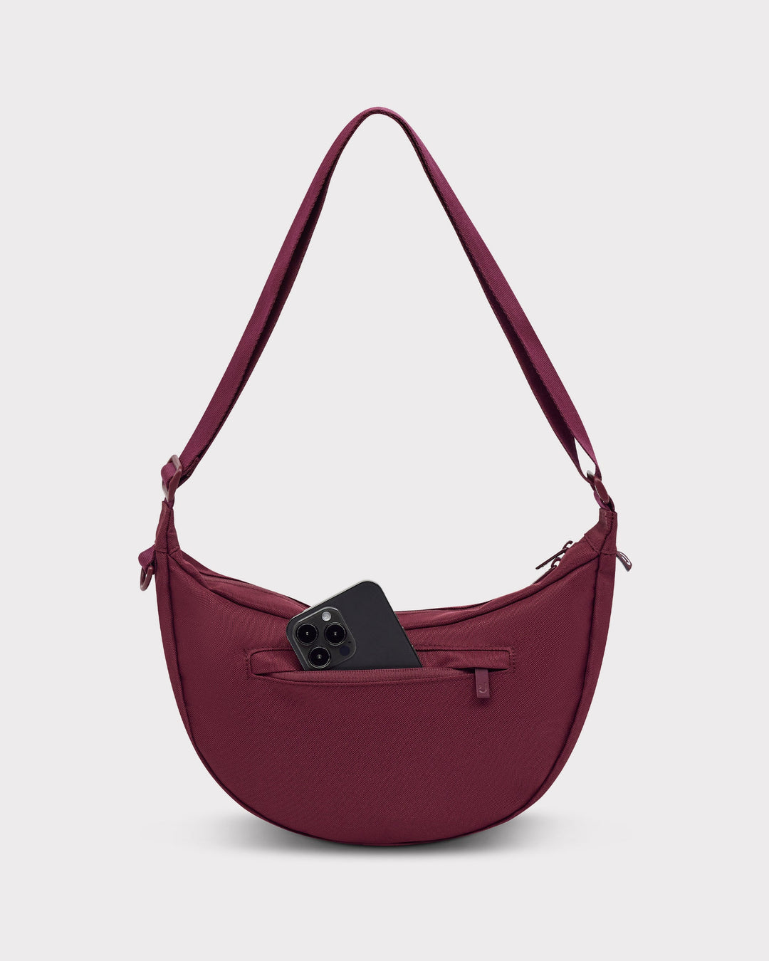 The Ally Medium Half-Moon Bag keeps your daily essentials organized