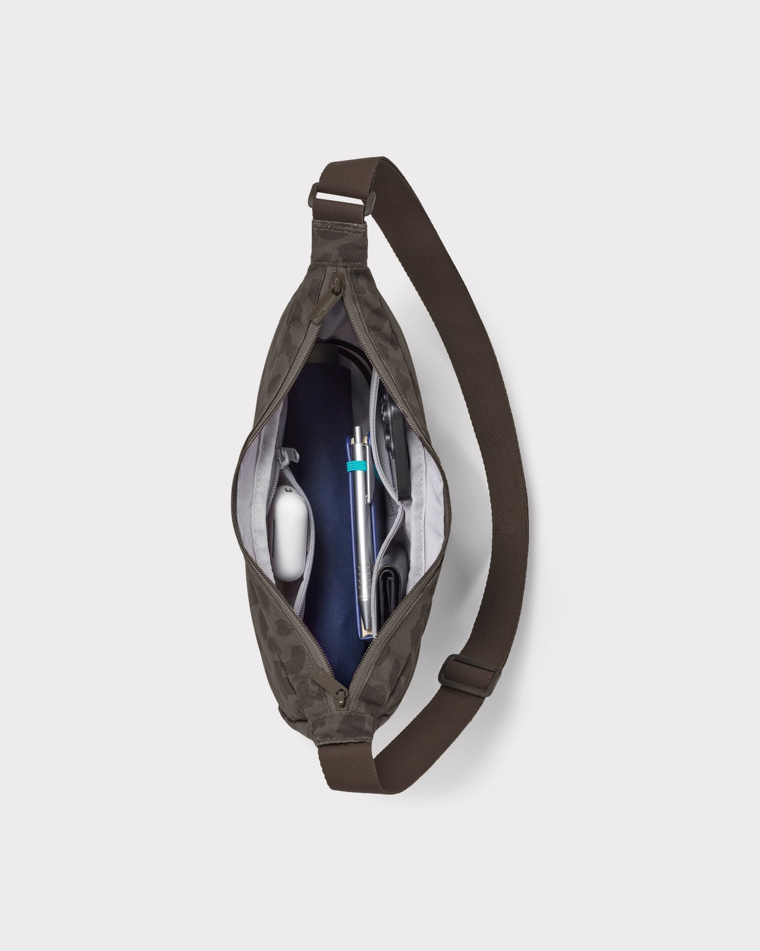 The Ally Medium Half-Moon Bag keeps your daily essentials organized