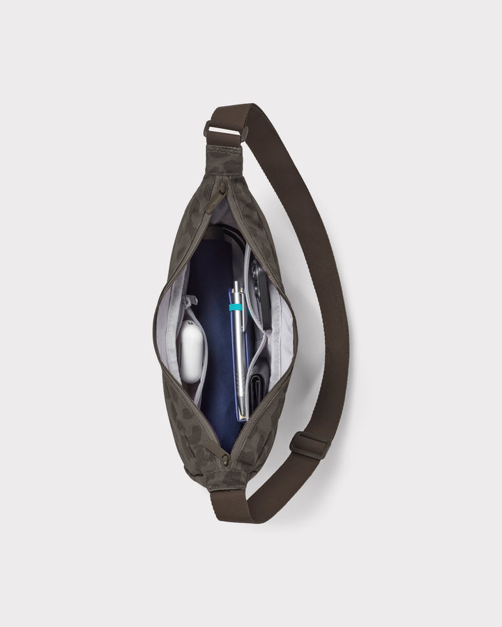 The Ally Medium Half-Moon Bag keeps your daily essentials organized