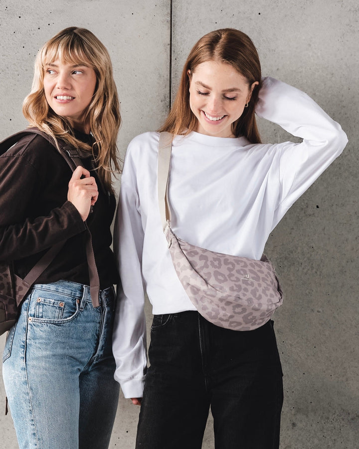 The Ally Medium Half-Moon Bag keeps your daily essentials organized