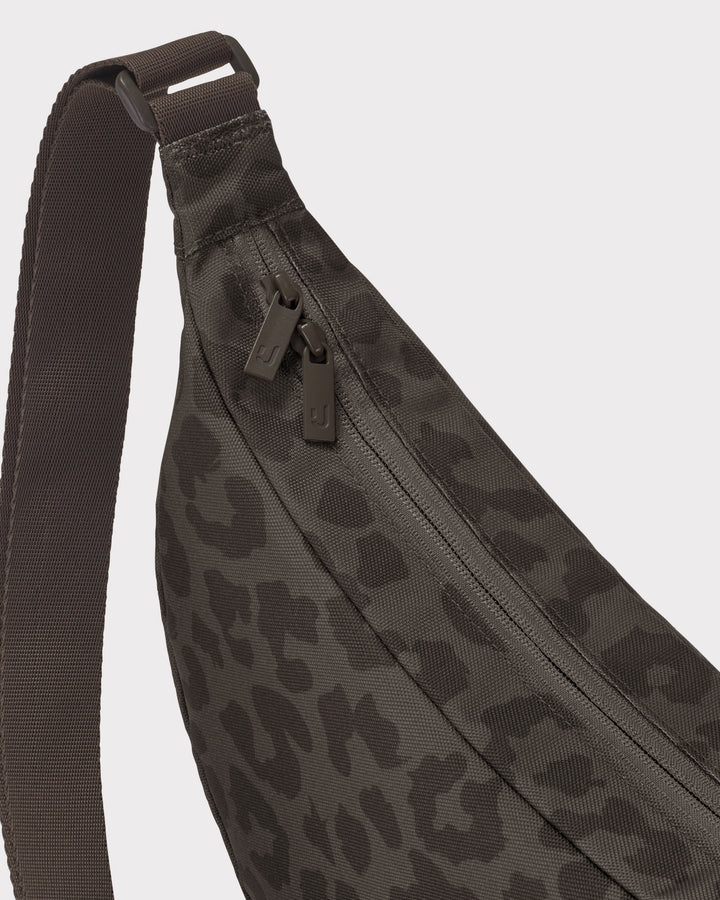 The Ally Medium Half-Moon Bag keeps your daily essentials organized
