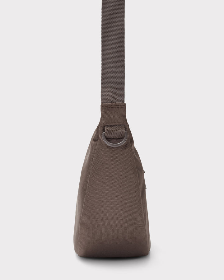 The Ally Medium Half-Moon Bag keeps your daily essentials organized