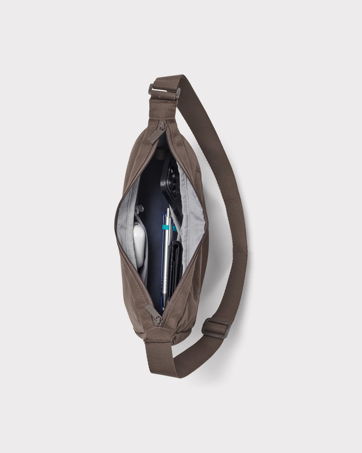 The Ally Medium Half-Moon Bag keeps your daily essentials organized