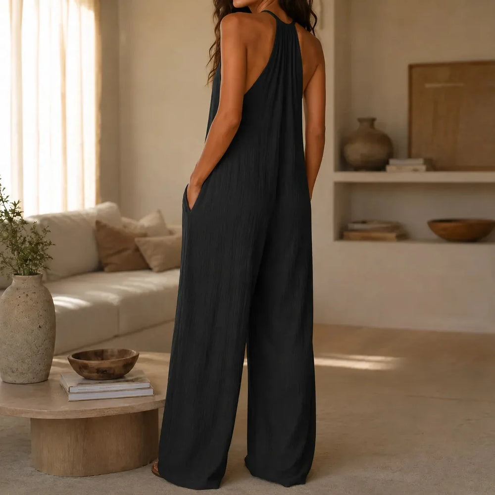 Drevana Halter Wide-Leg Jumpsuit with Deep Pockets, Flowy Drape - Elena Harper