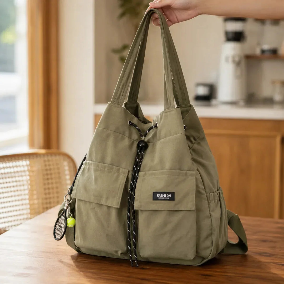 Carryall Convertible Drawstring Canvas Tote Backpack with Cargo Pockets - Elena Harper
