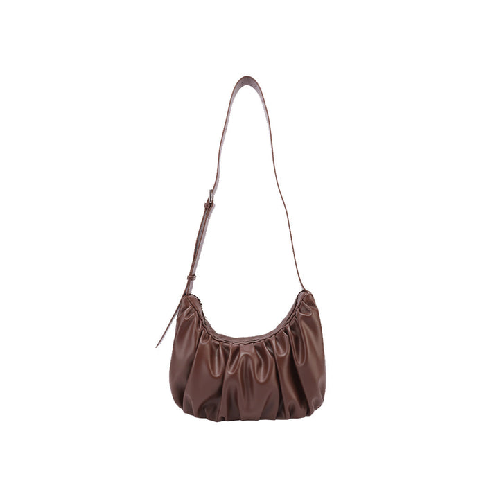 Chara | Croissant-shaped leather sling bag