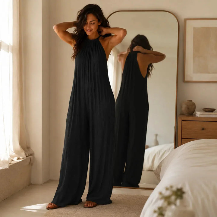 Drevana – Halter Wide-Leg Jumpsuit with Deep Pockets, Flowy Drape