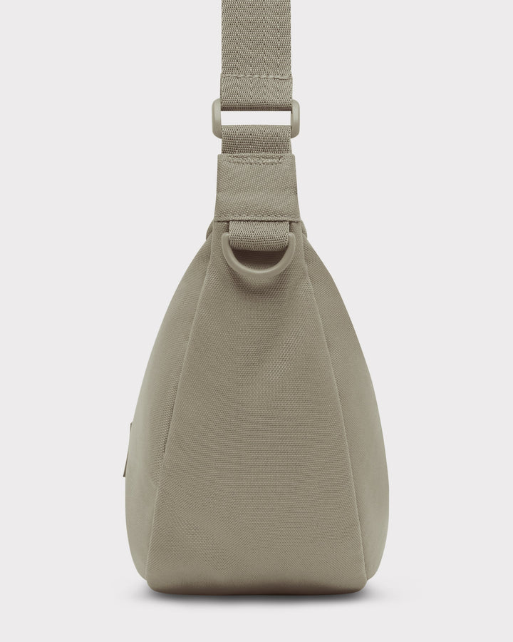 The Ally Medium Half-Moon Bag keeps your daily essentials organized