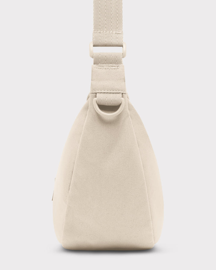 The Ally Medium Half-Moon Bag keeps your daily essentials organized