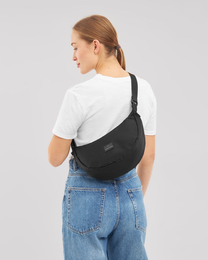 The Ally Medium Half-Moon Bag keeps your daily essentials organized