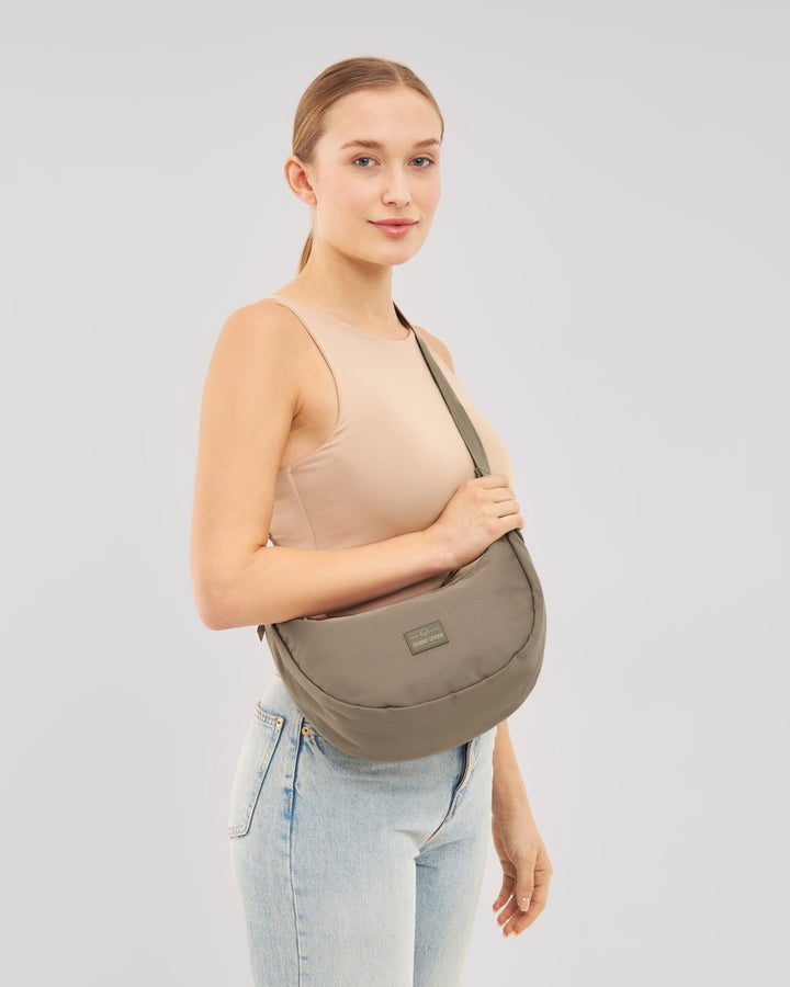 The Ally Medium Half-Moon Bag keeps your daily essentials organized