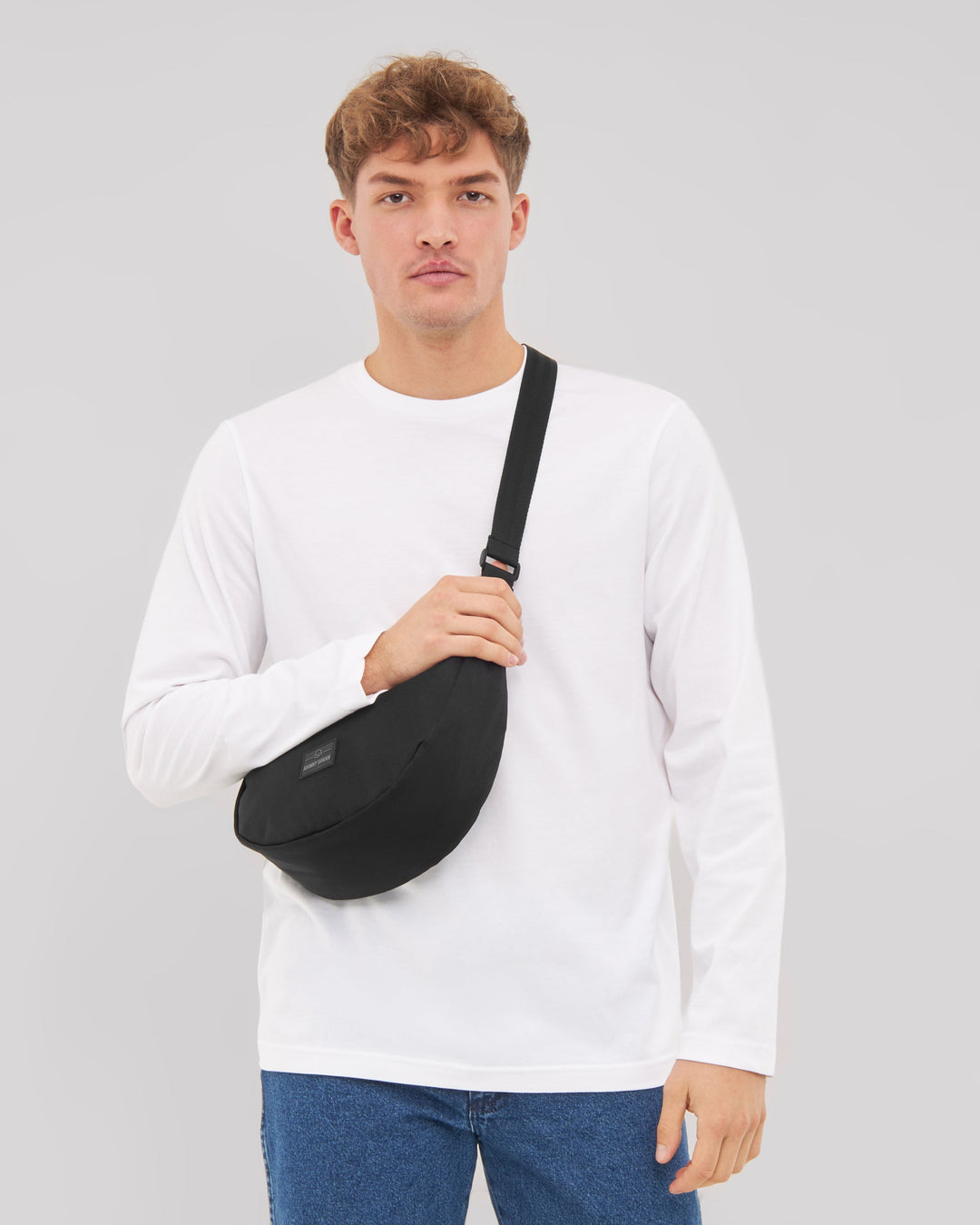 The Ally Medium Half-Moon Bag keeps your daily essentials organized