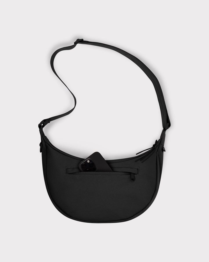 The Ally Medium Half-Moon Bag keeps your daily essentials organized