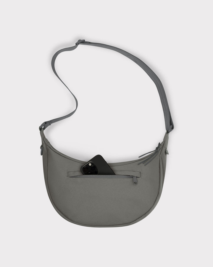 The Ally Medium Half-Moon Bag keeps your daily essentials organized