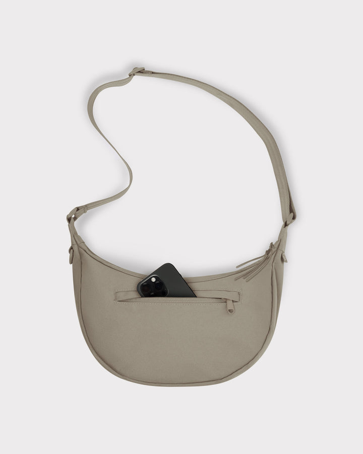The Ally Medium Half-Moon Bag keeps your daily essentials organized