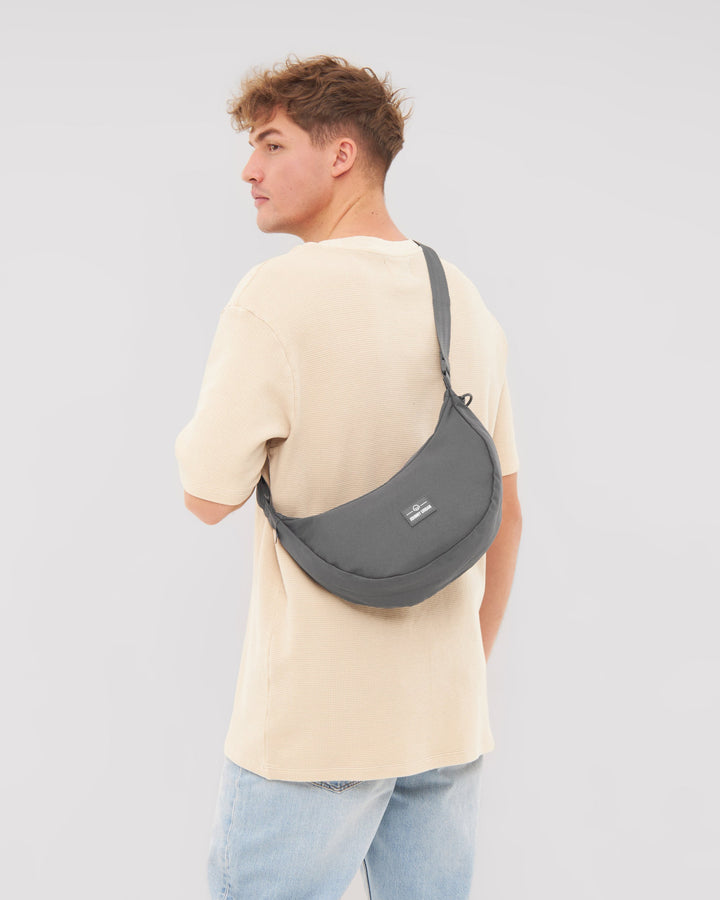 The Ally Medium Half-Moon Bag keeps your daily essentials organized