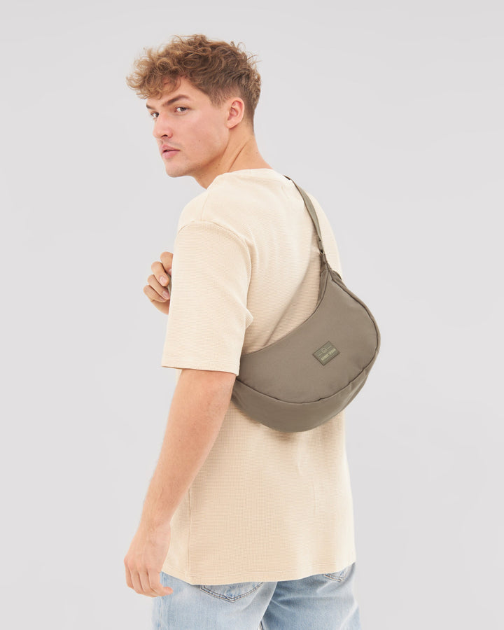 The Ally Medium Half-Moon Bag keeps your daily essentials organized