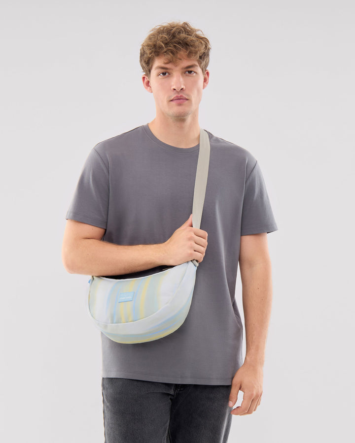 The Ally Medium Half-Moon Bag keeps your daily essentials organized