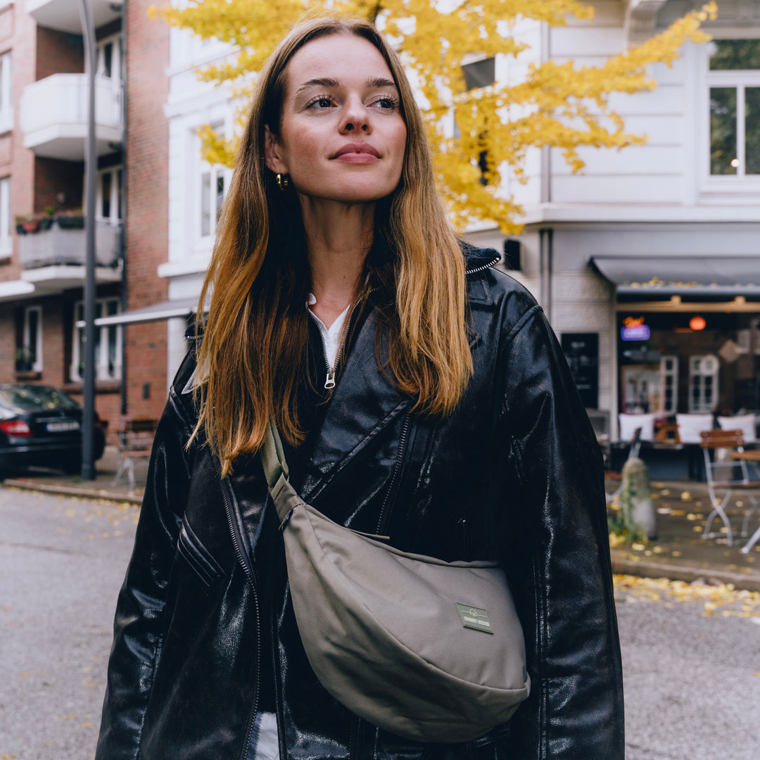 The Ally Medium Half-Moon Bag keeps your daily essentials organized