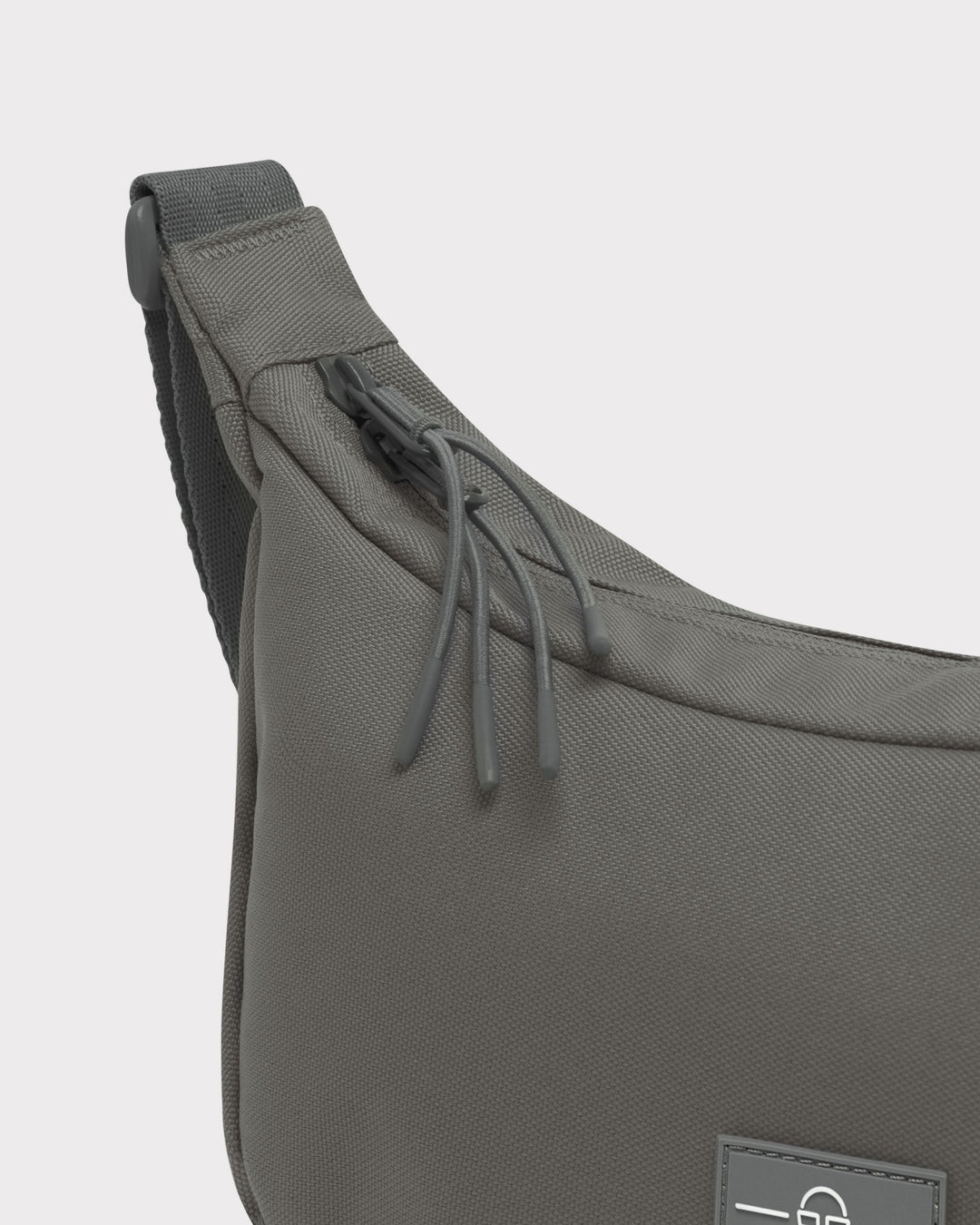 The Ally Medium Half-Moon Bag keeps your daily essentials organized