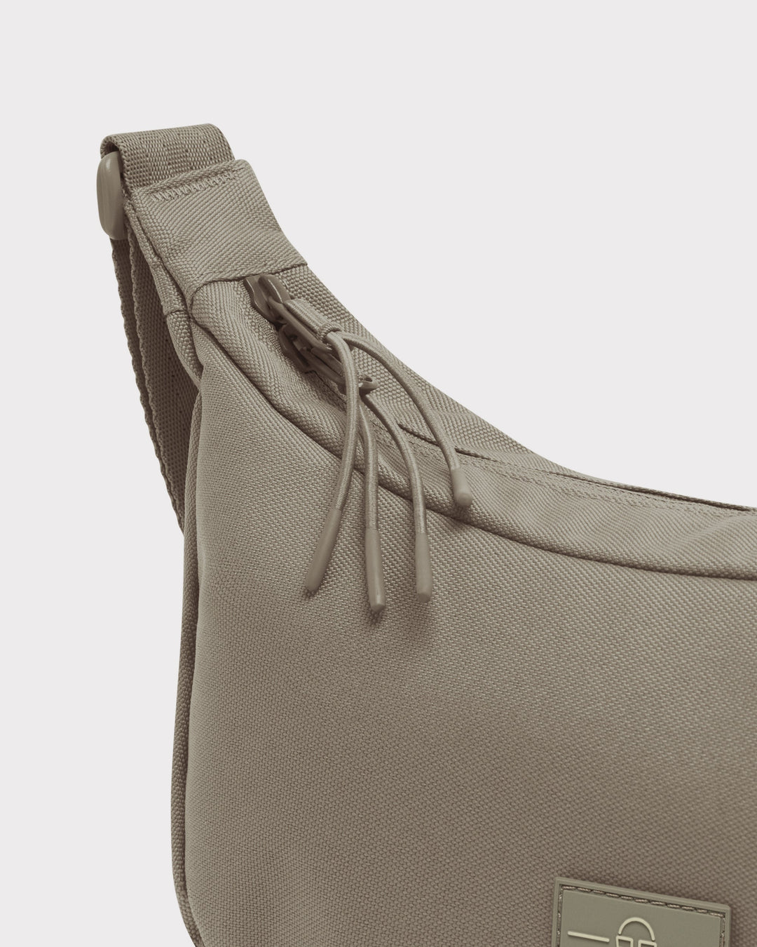 The Ally Medium Half-Moon Bag keeps your daily essentials organized
