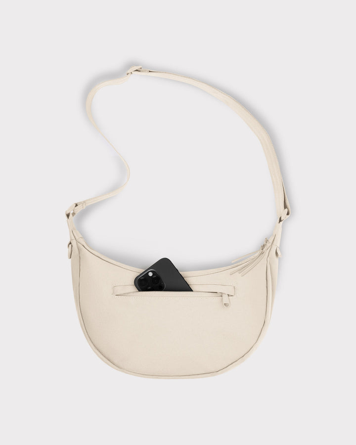 The Ally Medium Half-Moon Bag keeps your daily essentials organized