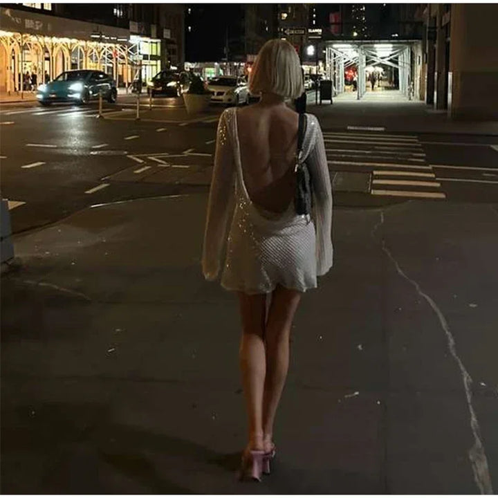 Zerynna™ | Backless shimmering long-sleeved mini dress