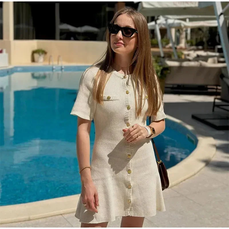 Carmenza - Elegant fine knit dress with golden buttons