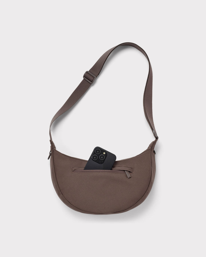 The Ally Medium Half-Moon Bag keeps your daily essentials organized