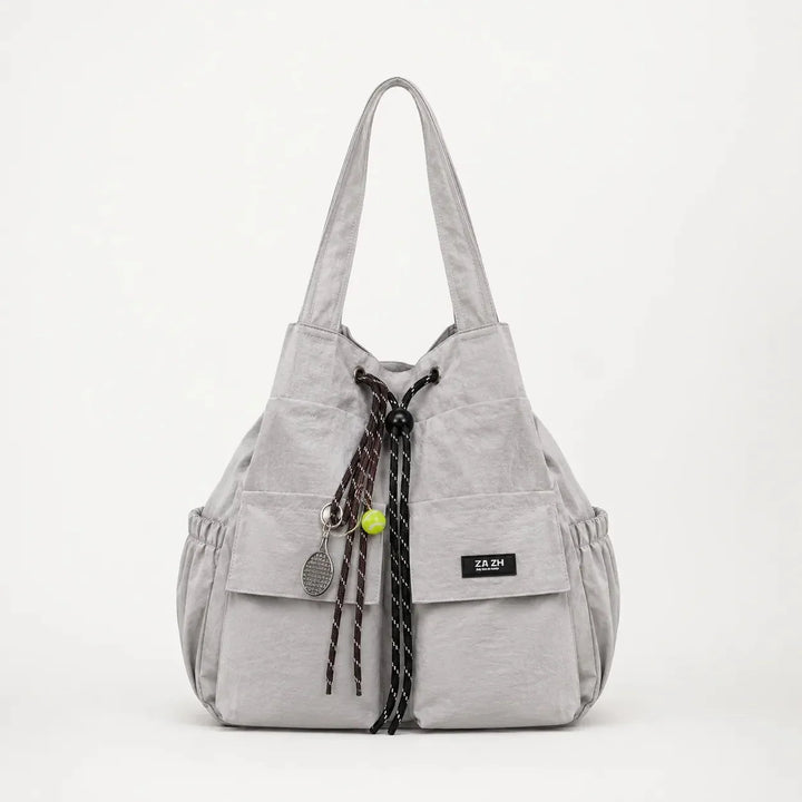 Carryall Convertible Drawstring Canvas Tote Backpack with Cargo Pockets - Elena Harper