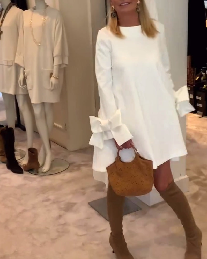 Nia Elegant Bow-sleeve Mini Dress - Elena Harper