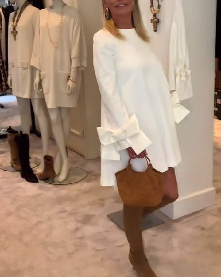 Nia Elegant Bow-sleeve Mini Dress - Elena Harper
