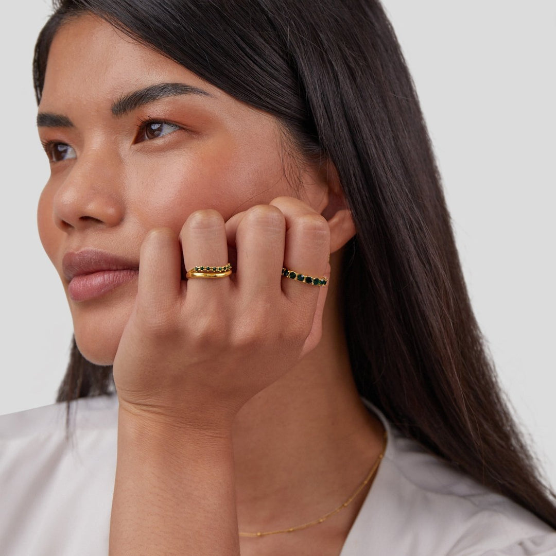 Elegant emerald-green ring with refined layers